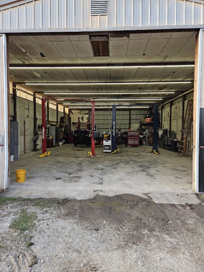 South Indy Auto Repair's multi-bay shop interior with two-post lifts